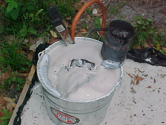 bucket with foam pattern in it  with sprue broke off.jpg